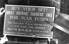 Detail of photograph showing New York suffragists advertising a "Great Suffrage Sacrifice Sale".  C.C. Catt Albums