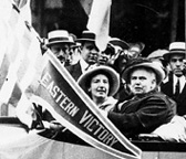 Anna Howard Shaw in her "Yellow Devil" car, campaigning for suffrage. C.C. Catt Albums, Bryn Mawr College Library